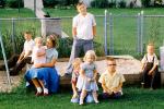 Backyard, sandbox, boys, girls, slide, July 1958, 1950s