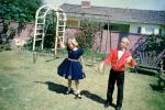 Backyard, boy, girl, dress, dressy, formal, April 1960, 1960s