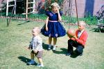 Girl, boy, ball, formal dress, Backyard, April 1960, 1960s