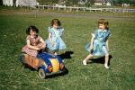 Pedal Car, Girls, laughing, smiles, formal dresses, dress, Akron Ohio, 1950s, PLGV03P15_17