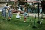 Girl on Stilts, Swing Set, Girls, Boy, Mother, August 1958, 1950s, PLGV04P04_01