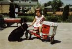 Girl on a Peddle Car, Tractor, Garton, August 1961, 1960s