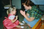 Playing Patty-Cake, hands, arms, dress, Mom, Daughter, 1950s, PLGV04P04_16B
