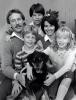 Family Group Portrait with Dog, smiles, brother, sister, siblings, mother father