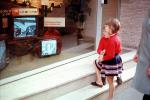 Girl watching TV, Television Screen, window shopping, October 1972, 1970s, PLPV01P10_11