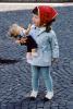 Girl and her doll, scarf, jacket, coat, cold, 1960s, PLPV01P10_12B