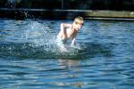 Boy splashing water, Fountain, Pond, Bratsk, Siberia, PLPV02P13_13