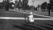Girl, Chair, costume, sidewalk, frontyard, 1930's
