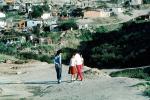 Girls Walking, Friends, Shacks, Shanty Town, Colonia Flores Magone, PLPV06P08_02