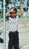Boy behind a fence, Colonia Flores Magone, PLPV06P09_09