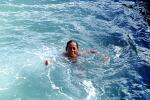 Girl Swimming in Ocean