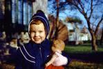 Girl with her doll, hat, jacket, Smiling Girl, face
