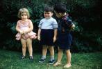 Girl, Boys, siblings, sister, brother, standing, backyard, 1950s, PLPV16P11_03