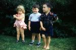 Girl, Boys, siblings, sister, brother, standing, backyard, 1950s, PLPV16P11_04