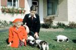 Hat, Coat, Puppies, Puppy, boy, girl, frontyard, 1950s