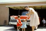 Girls, Mother, dress, glasses, 1959 Ford Fairlane, car, garage, 1950s