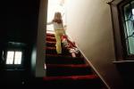 Girl walking upstairs with a Doll, PLTV01P06_04