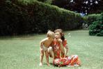 Toddler Blowing bubbles, Boy, Backyard, 1950s, PMCV03P04_07