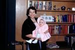 Baby, Bonnet, Coat, Bookshelf, Toddler, books, daughter, May 1954, 1950s, PMCV03P13_04