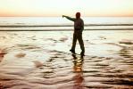 Bucky Pointing, beach, sand, ripples, waves, Pacific Ocean, sunclipse, Santa Monica, California, Wavelets, POFV01P03_15