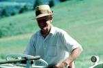 Smiling man with his tractor, Burklyn, Burke, Vermont, 1970s, PORV02P02_14