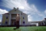 Portrait of Marshall Thurber, clouds, mansion, Burklyn Hall, Burke, Vermont, 1970s, PORV02P03_07