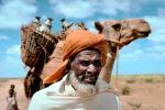 Man with Camel, Refugee from war, Nomad, Nomadic, Somalia, PORV03P02_11.0848