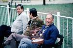 Men sitting on a Bench, Smiles, Laughing, 1982, 1980s, PORV03P14_08
