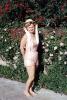 female, woman, women, smile, bathing suit, hat, flowers, September 1965, 1960s, PORV24P09_05