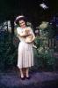 Woman with her Cat, hat, smiles, dress, 1950s, PORV24P10_08