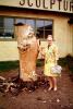 Woman, purse, sculpture, Gaspe, Canada, 1960s, PORV24P11_16
