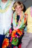 Woman, Mother, smiles, flowery dress, pants, lei, 1960s, PORV24P14_02B
