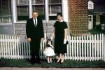 Male, Guy, Masculine, Caucasian, Girl, Female, Feminine, woman, lady, Child, Formal, suit and tie, picket fence, brick, window, 1940s