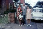 Family, Mother, Father, Dad, Mom, sidewalk, Cars, vehicles, 1950s