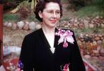 Women, female, formal dress, Corsage, orchid, flower, ribbon, smiles, glasses, 1950s, PORV25P14_09