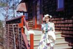 Pretty Lady, formal dress, hat, coat, stairs, backyard, home, house, 1950s, PORV25P15_19
