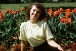 Woman, Smiles, happy-go-lucky, gardens, 1950s, PORV26P12_07B