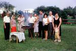 Bar bq, backyard, table, group, family, 1970s, PORV27P02_01