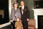 Family, father, mother, daughter, coats, 1950s, PORV29P01_13