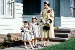 Coats, corsage, girls, smiles, cat, steps, Akron Ohio, 1950s, PORV29P01_16