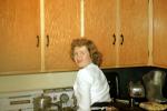 Woman, Cupboards, Stove, Shirt, Alice Bush, 1953, 1950s, Parkforest Illinois, PORV29P11_15