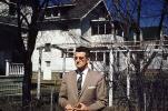 Man, Houses, Suburbia, glasses, suit and tie, 1940s, PORV30P01_02