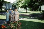 Octogenarians, Grandmother, women, cane, man, flowers, front yard, 1940s