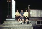 Women Sitting on the Front Porch, steps, hair ribbons, 1940s, PORV30P04_01