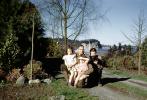 Father with Daughters and son, dog, 1950s