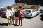 El Toreo de Tijuana, Downtown Bull Ring, Cars, Women, daughter, bouffant hairdo, 1960s, PORV30P05_01