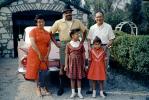 African American Family Portrait in front of a car, smiles, purse, girls, 1950s, PORV30P06_05