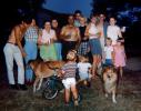 Family Group, tricycle, collie dog, men, women, 1960s, PORV30P09_11