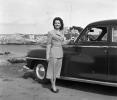 Woman with her Car, smiles, windy, 1940s, PORV30P12_09