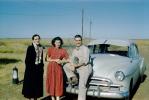 Couple in front of their car, 1940s, PORV30P14_02